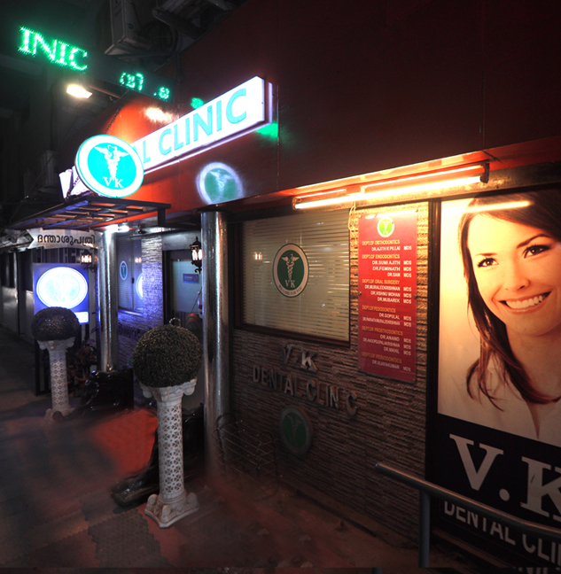 VK Dental Clinic exterior view at night
